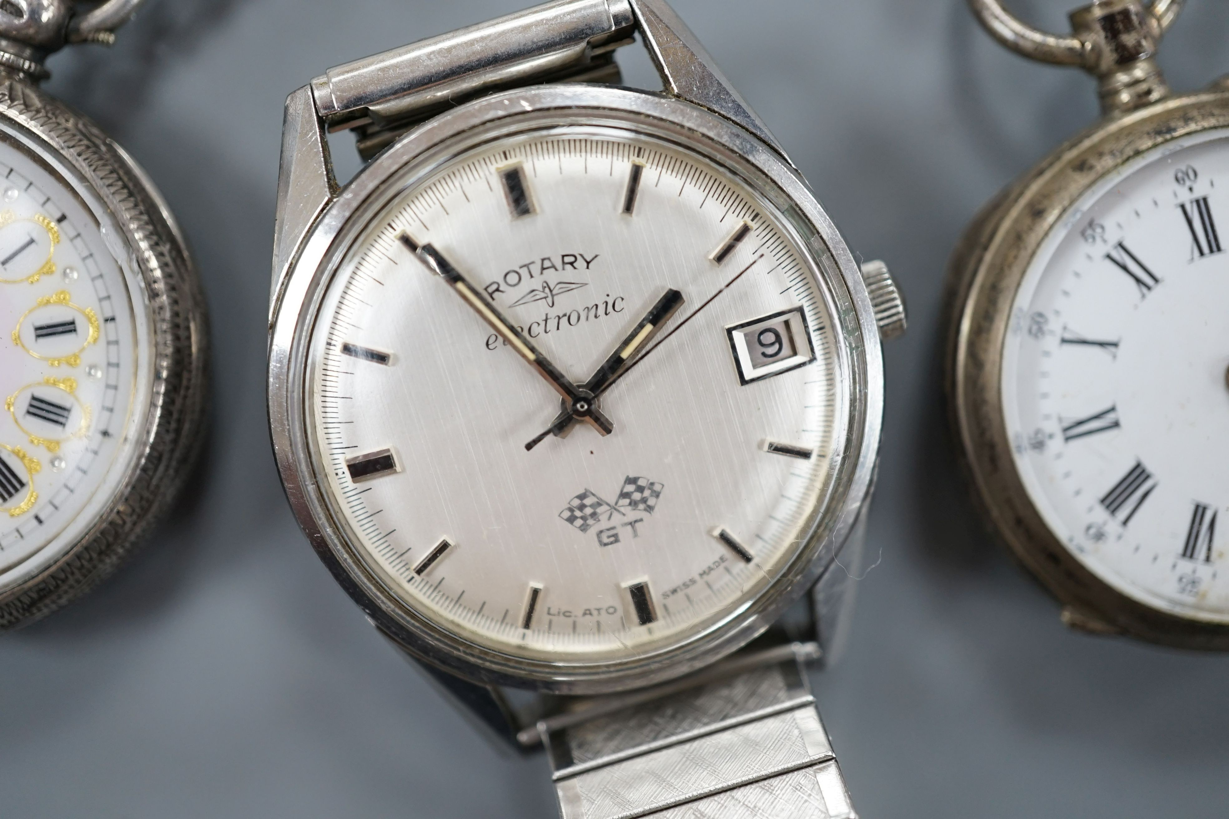 A gentleman's steel Rotary Electronic GT wrist watch and two Swiss white metal fob watches